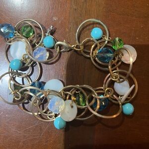 Elegant Gold and Blue Charm Bracelet